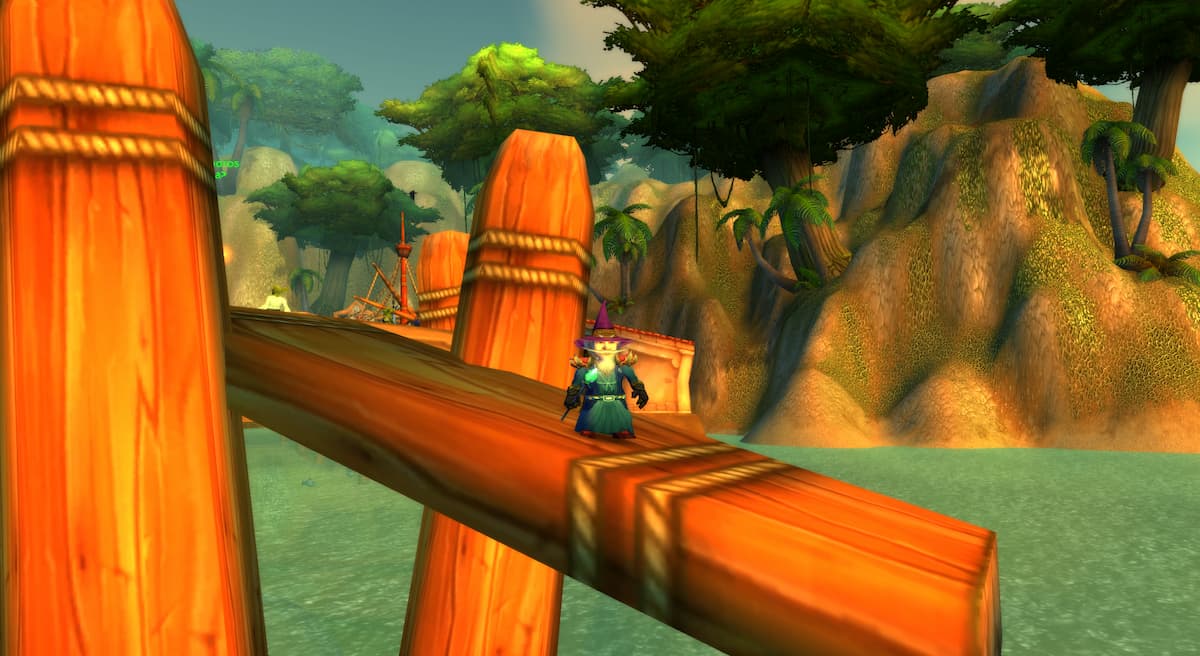 A gnome standing on the docks waiting for a boat at Booty Bay in WoW Classic