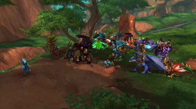 Players gathering with the Obsidian Outcast forces ahead of the Siege on Dragonbane Keep in WoW Dragonflight
