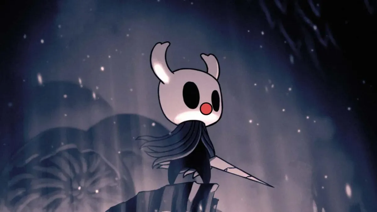 Hollow Knight character stands with their sword at the edge of a cliff.