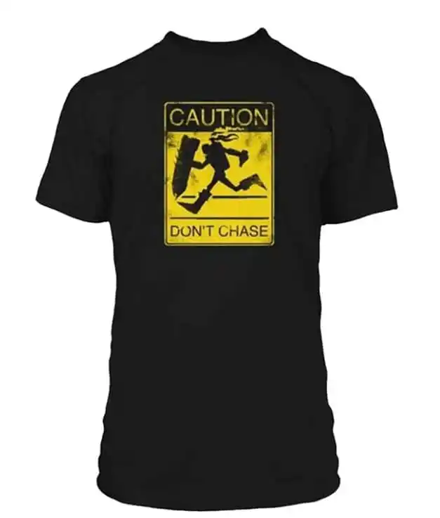 Singed and caption "Caution, Don't chase" on a black T-shirt.
