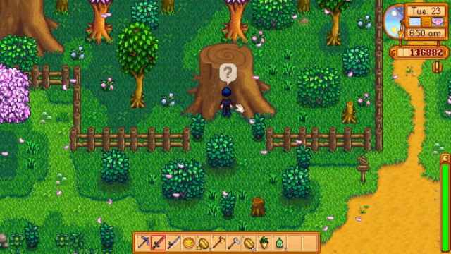 Stand in front of the big tree to activate a quest in Stardew Valley.