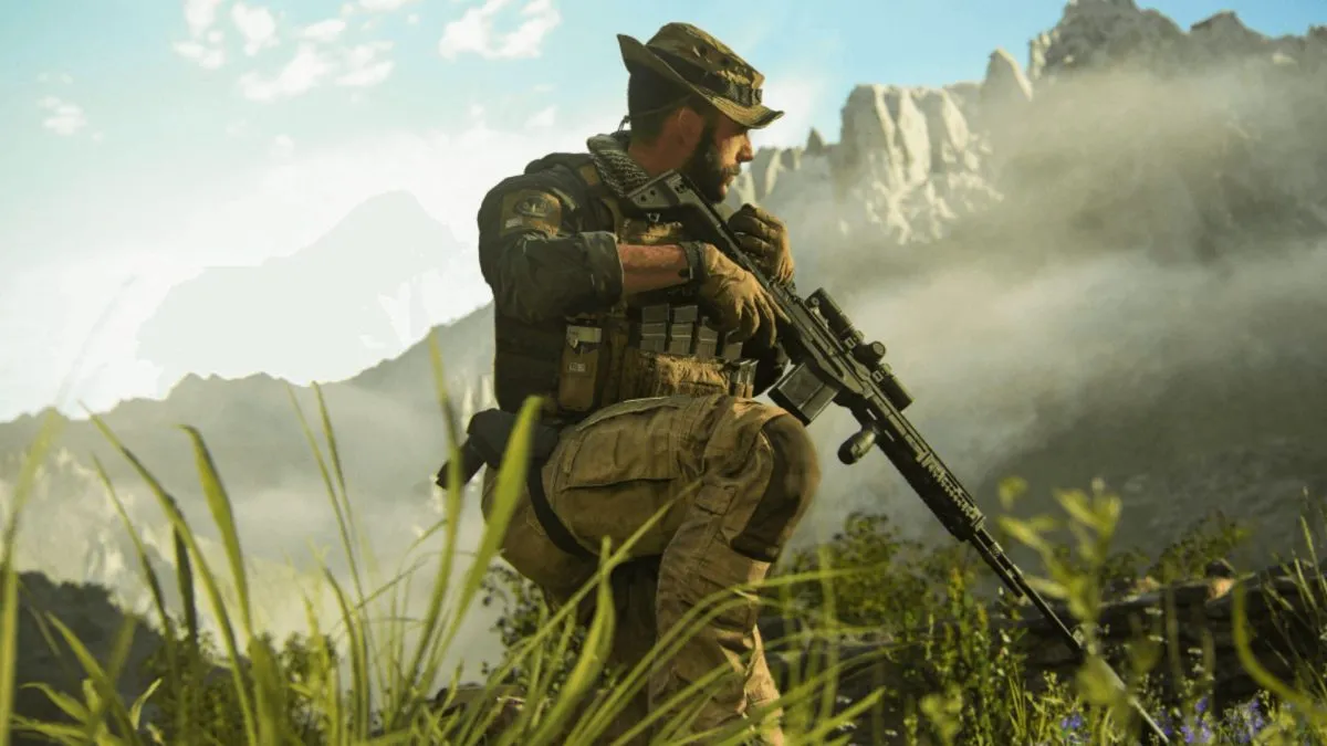 Captain Price in CoD MW3 kneeling in the grass outside an enemy base.