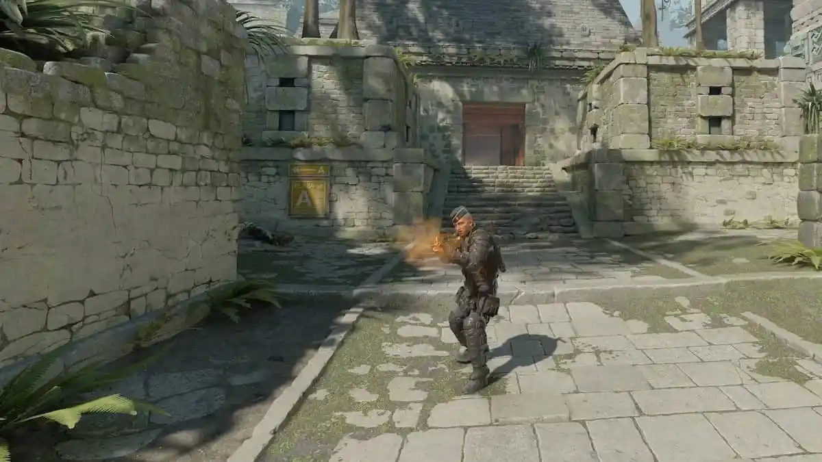 A CS2 character firing their weapon.