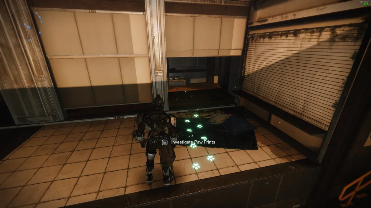 A guardian stands next to a robotic dog's pawprints in the Tower in Destiny 2.