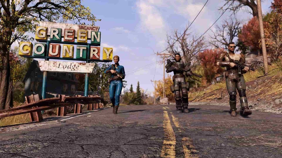 Players walk alongside a road in Fallout 76.