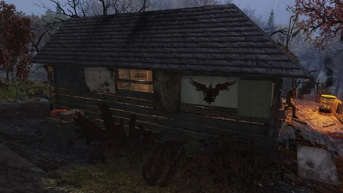 The Blood Eagle loco painted on the side of a cabin in Fallout 76.