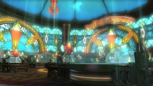 An elegantly lit room with Lord of Verminion tables in Final Fantasy XIV.