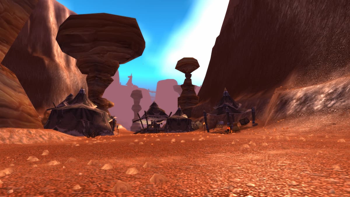 Thousand Needles before the Cataclysm in World of Warcraft Classic. Spires can be seen throughout the foreground.