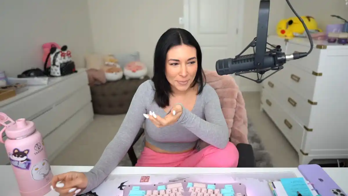 Alinity streaming at her setup during a Twitch stream