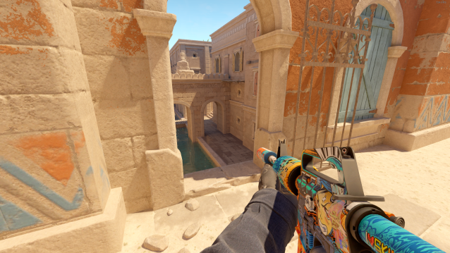 A player holding an M4A1-S on Anubis' bridge in CS2.