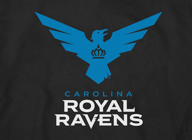 Carolina Royal Ravens logo, featuring a blue bird graphic with outstretched wings and a crown printed on it.