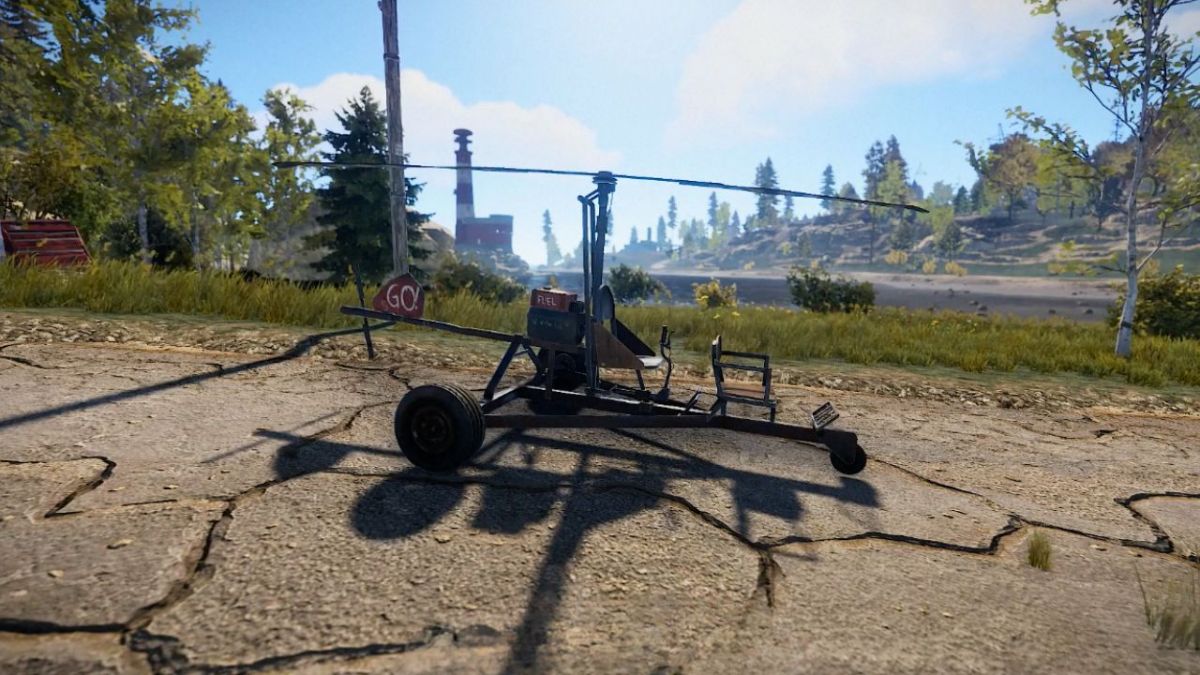 a minicopter on a road in rust