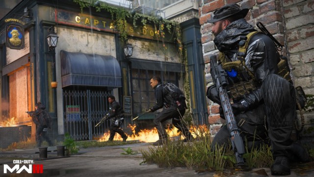 One Operator taking cover up close and the rest looking to fight with guns in hand in MW3.