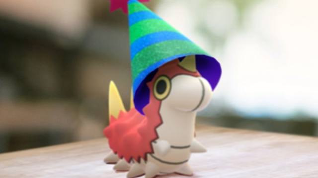 Party Hat Wurmple partying in Pokemon Go.