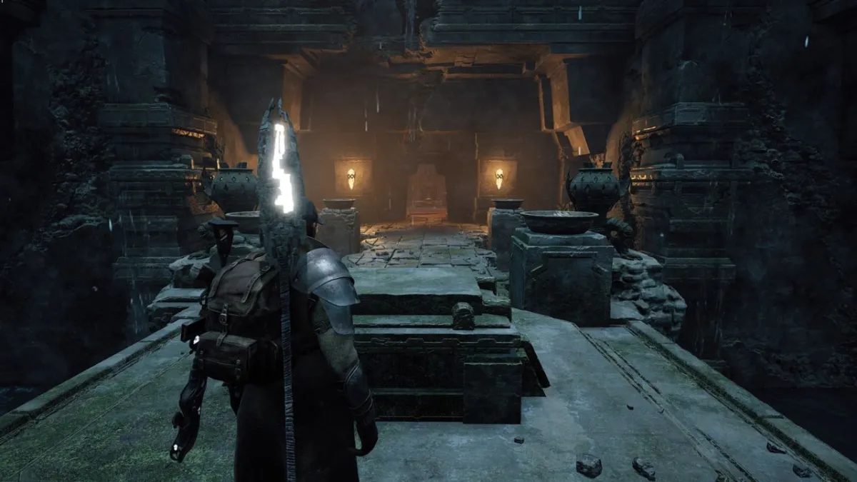 The player character standing in the last room of the Proving Grounds in Remnant 2.