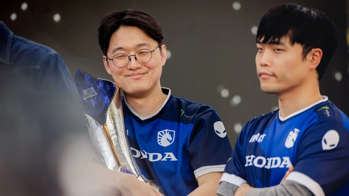 "CoreJJ" (L) and "Impact" of Team Liquid Honda after victory at the LCS Spring Finals at the Riot Games Arena on March 31, 2024