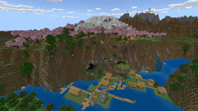 The village underneath a cherry blossom biome in seed 8408163781592364355 in Minecraft.