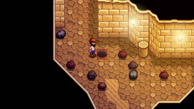 A player standing next to a shaft in the Skull Cavern in Stardew Valley.