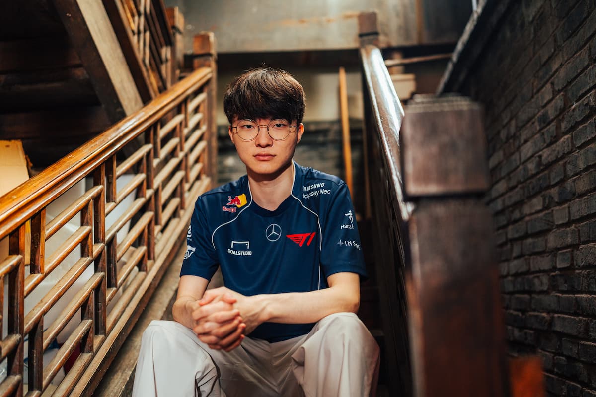 Faker sitting on stairs at a promo image photoshoot for MSI 2024