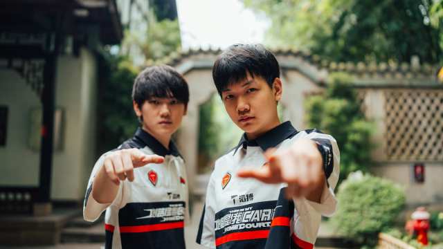 Wenbo "JackeyLove" Yu (L) and Lin "Creme" Jian of Top Esports during MSI Play-Ins