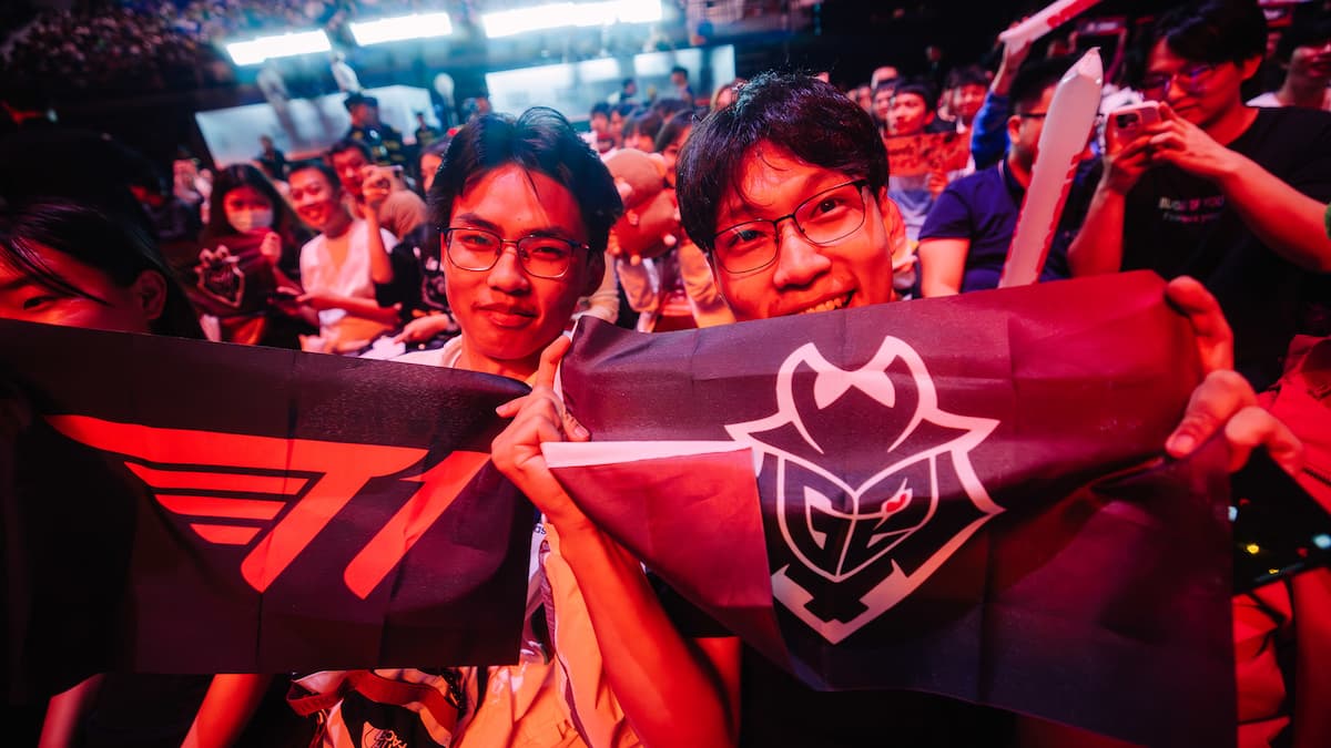 Fans in the audience show their support during MSI 2024.