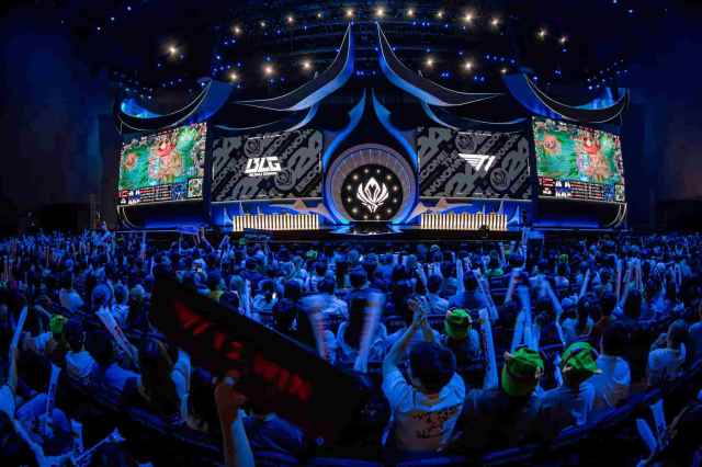 Fans in the audience show their support during MSI 2024 Bracket Stage at the Chengdu Financial City Performing Arts Center in Chengdu, China.