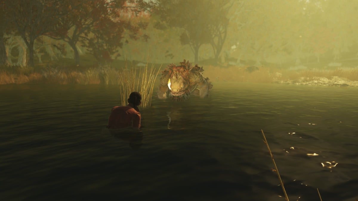 Image of a player character crouching down in swampy water with an Angler charging towards her. There is a layer of fog and mist covering the water.