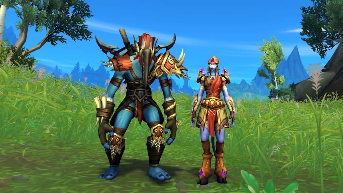 Troll and Draenei standing next to each other in their Heritage Armors