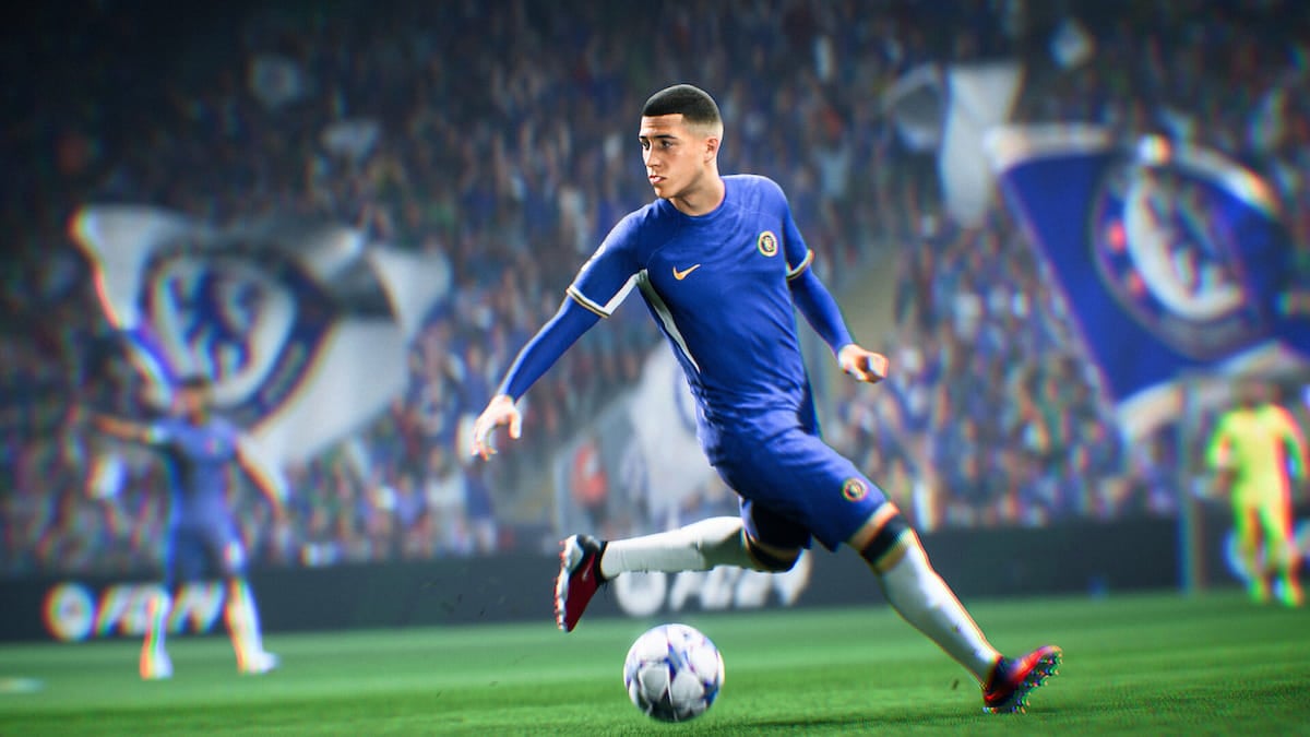 A Football player in blue jersey and shorts in the field of play; EA FC 24 official screenshot