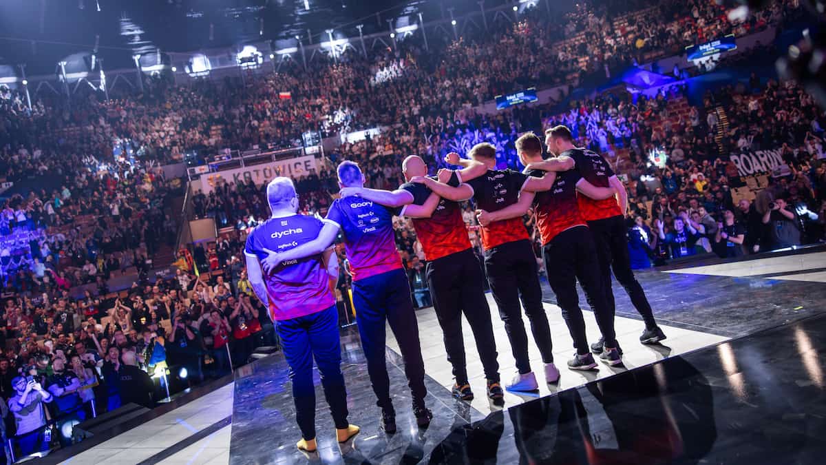 ENCE bowing after a loss at IEM Katowice 2024 playoffs.