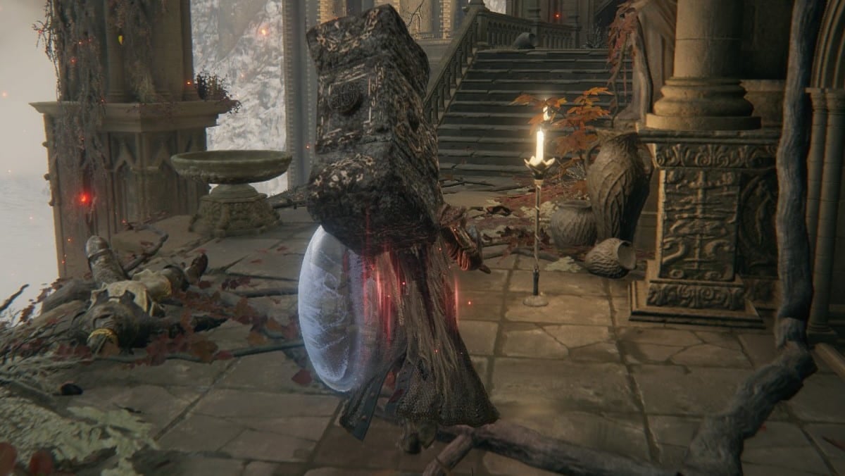 The Tarnished wields a large weapon in Elden Ring.
