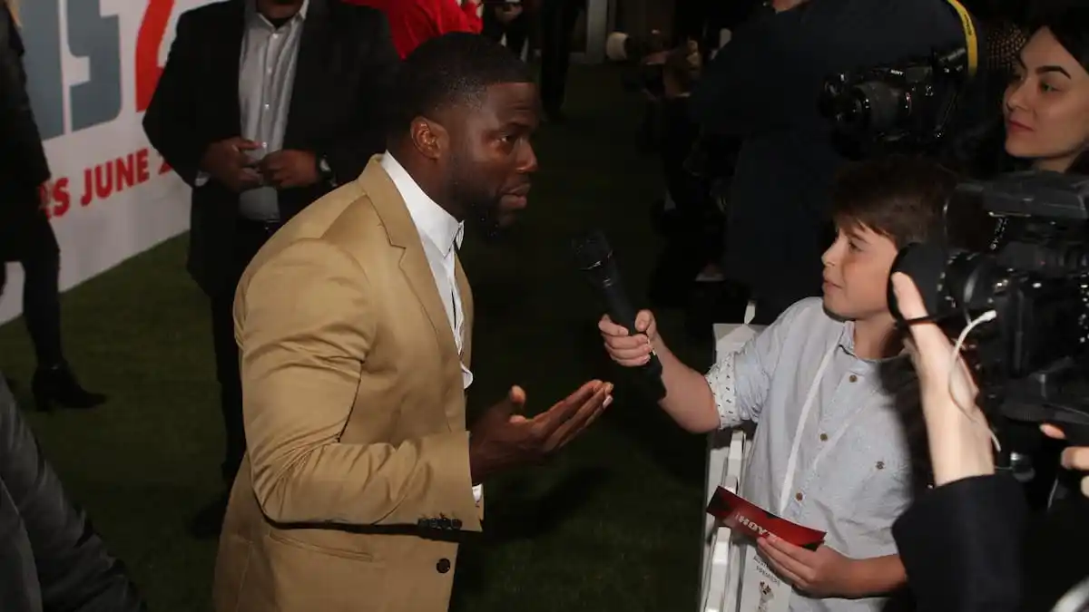 Kevin Hart interviewed at a movie premiere.