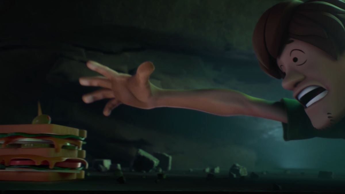A screenshot of a Multiversus cutscene that shows Shaggy reaching for a sandwich.