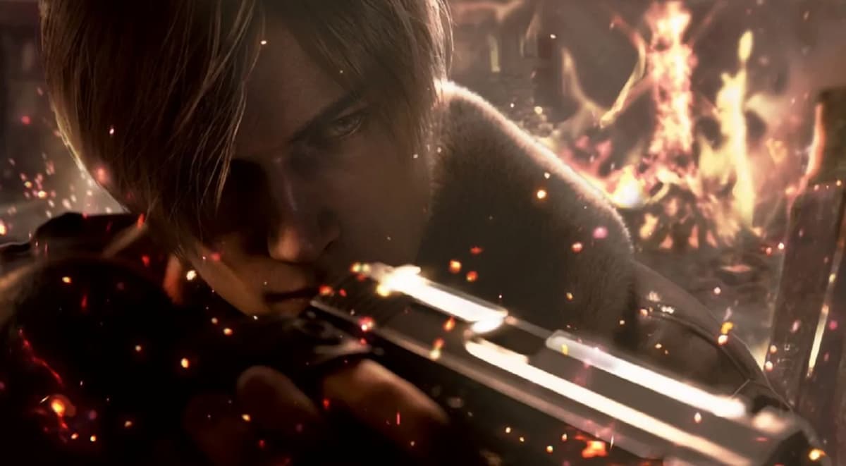 A close shot of Leon Kennedy holding his gun, while there are flames behind him.