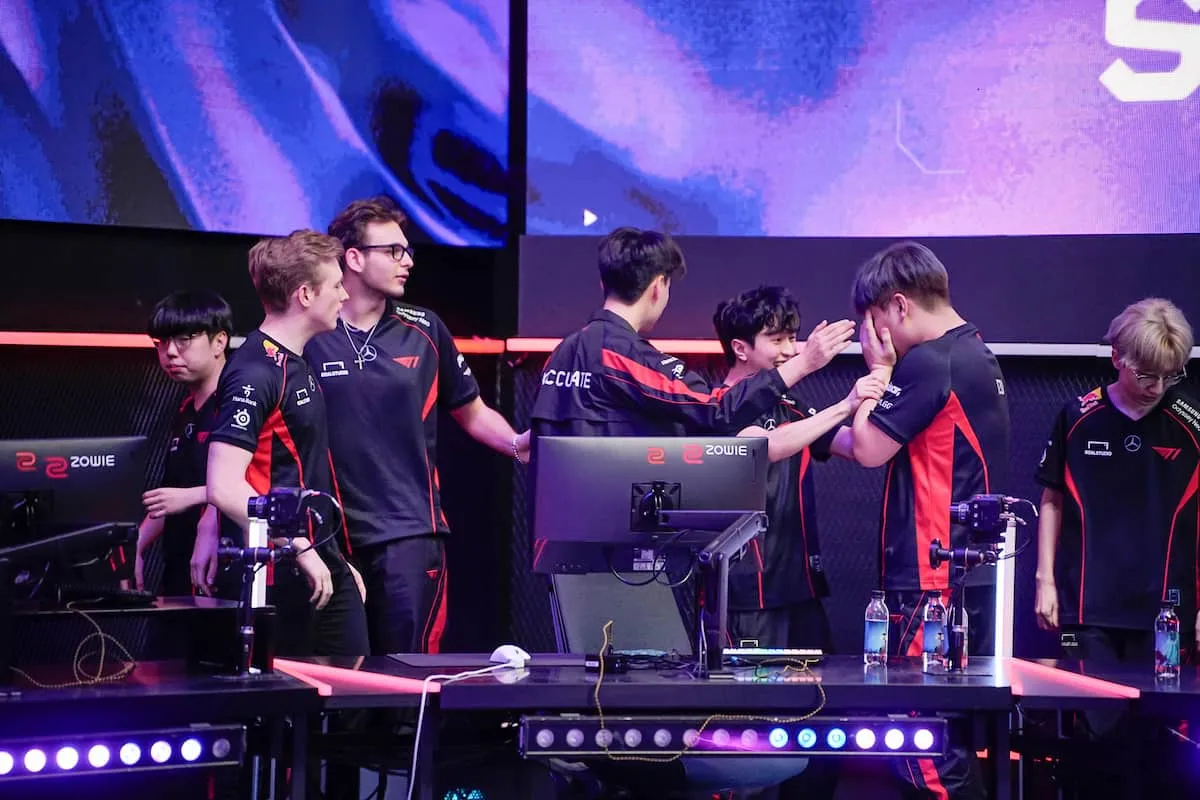 T1 celebrates qualifying for Masters Shanghai on stage at VCT Pacific playoffs.