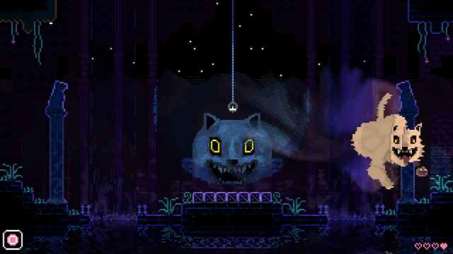Image of a level in Animal Well featuring strange cats.