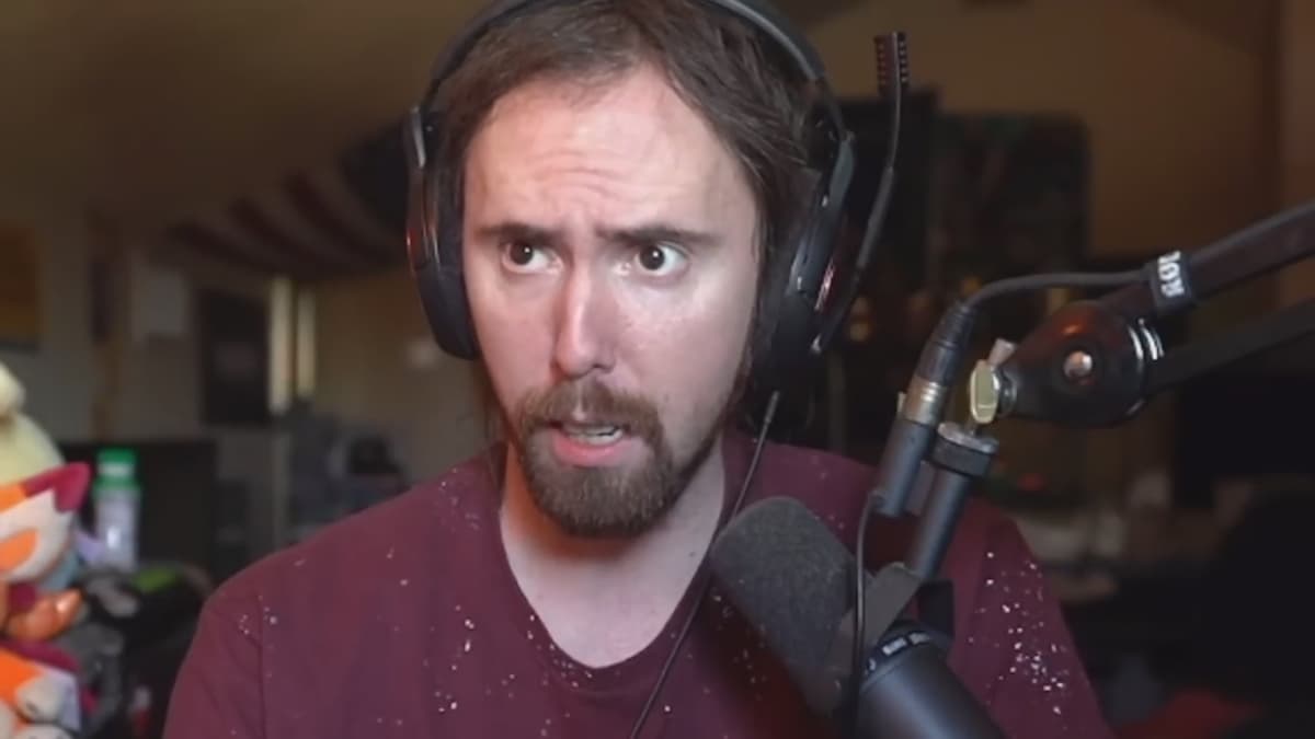 Asmongold reacting to an Ubisoft fan calling for his demise during a livestream.