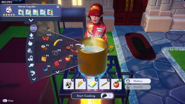 Cooking Minnie Cupcakes in Disney Dreamlight Valley.