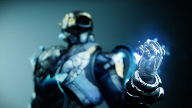 A Titan clutches its fist with Arc energy in Destiny 2.