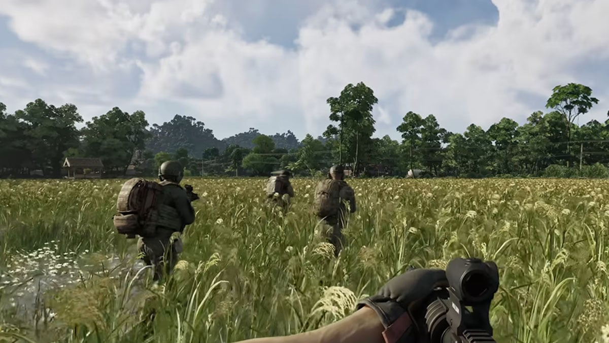 Soldiers walk through a grassy field in Lamang in Gray Zone Warfare.