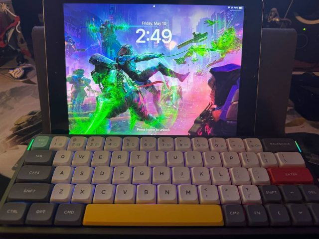 NuPhy Air60 V2 keyboard with an iPad in the background