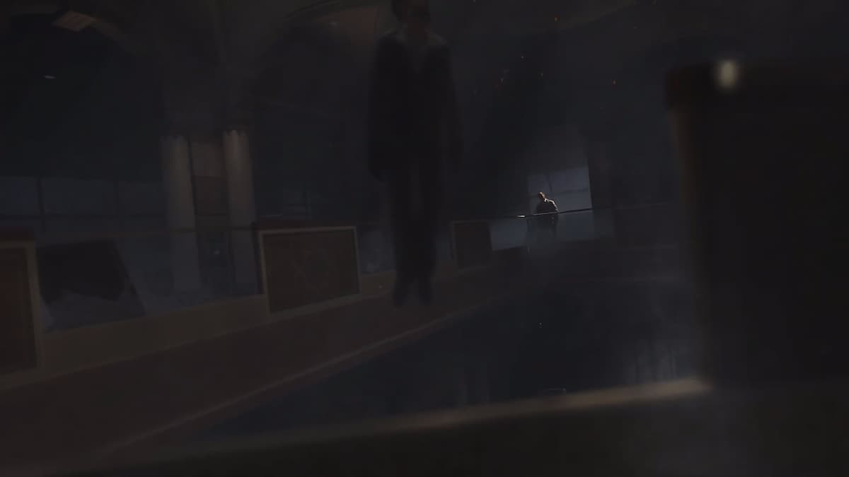 Makarov hanging from the ceiling and a strange man appearing behind him, as seen by Captain Price in Modern Warfare 3.