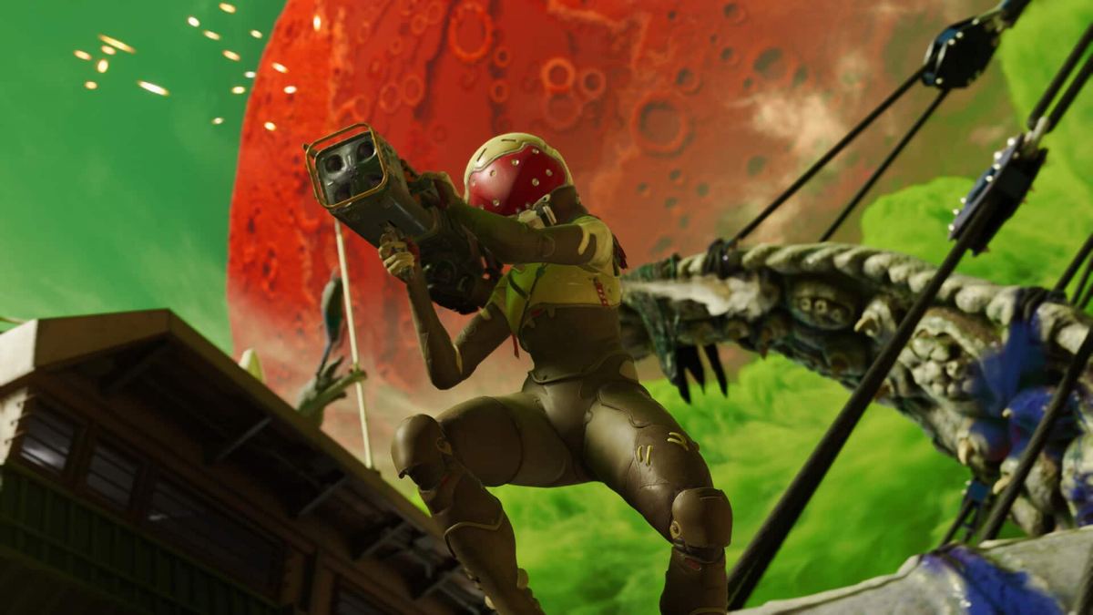 A character in a greenish space suit fires a large fun, a tentacle is behind them