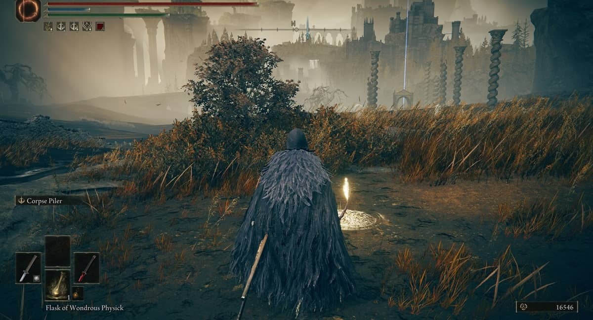 Player character at a site of grace with buildings and foliage in the background