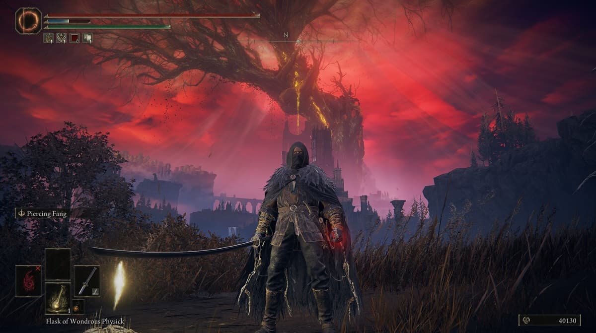 Player character holding a sword with a shadowy tree nestled against a red background