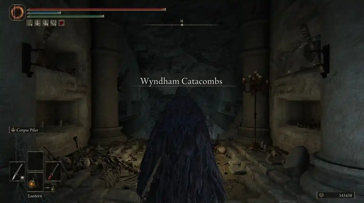 The player character at the Wyndham Catacombs' entrance in Elden Ring