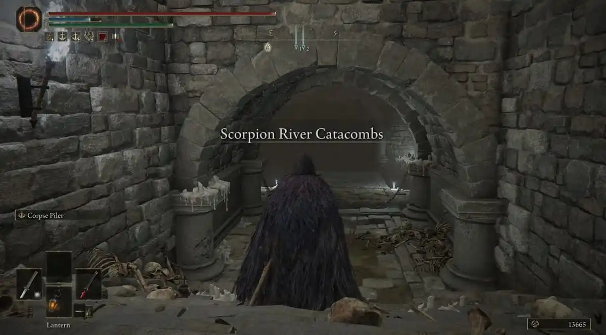 Player character standing in the Scorpion River Catacombs in Elden Ring