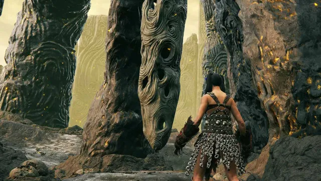 Elden Ring character looking at the Finger bell in the Finger Ruins in Elden Ring Shadow of the Erdtree