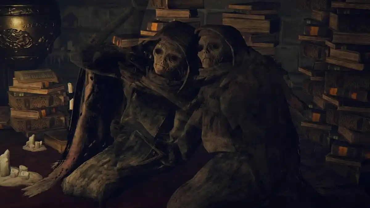 The Twin Maiden Husks sitting together staring at the player character in Elden Ring