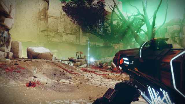 A guardian holds Faith-Keeper on the Watcher's Grave in Nessus in Destiny 2. This destination is home to the Episode: Echoes activities.